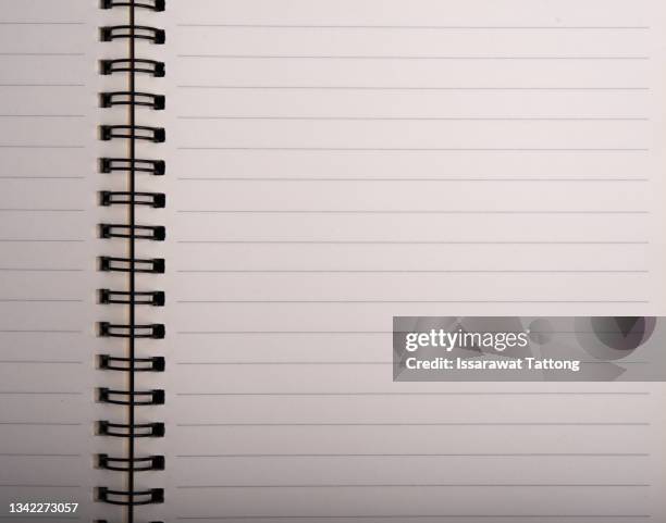 top view of open school notebook with blank pages for taking write notes on wood table background. flat lay, creative workspace office. business-education concept with copy space. - folder mockup stock pictures, royalty-free photos & images
