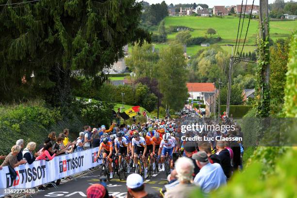 General view of the Peloton passing through Smeysberg while fans cheer during the 94th UCI Road World Championships 2021 - Men U23 Road Race a...