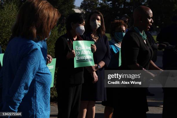 Rep. Ayanna Pressley speaks as Rep. Judy Chu , Rep. Diana DeGette and Rep. Barbara Lee listen during a news conference outside the U.S. Capitol on...