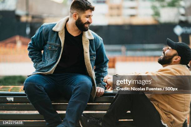 young gay couple enjoying each others company in the city,santiago de chile,chile - santiago chile street stock pictures, royalty-free photos & images