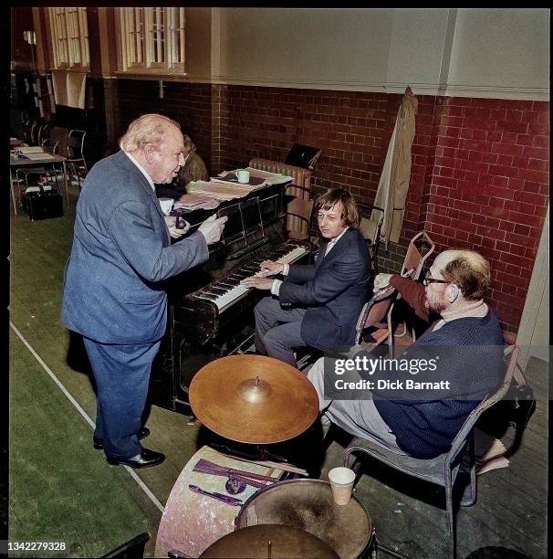 Image has been digitally converted to colour from a black and white analogue original.) Andre Previn with Johnny Mercer and J B Priestley at 'Good...