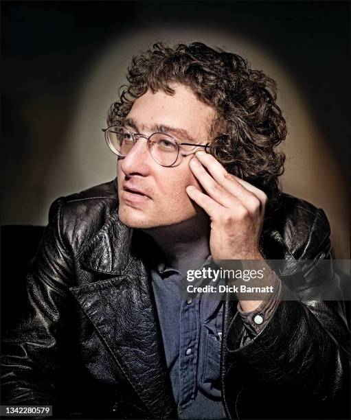 Image has been digitally converted to colour from a black and white analogue original.) American singer-songwriter Randy Newman at the offices of the...