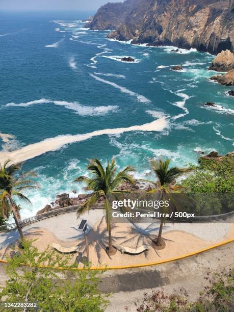 high angle view of beach against sky,acapulco,guerrero,mexico - acapulco fotografías e imágenes de stock