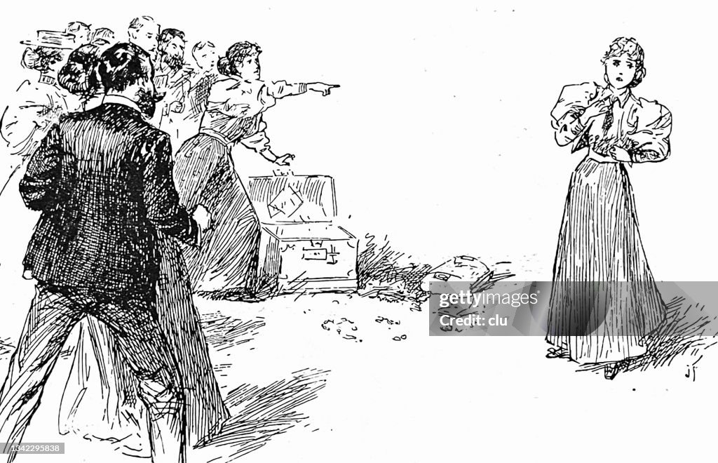 Woman in a group of people points to a single, other woman: she, she is guilty