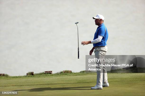 Lee Westwood of England and team Europe reacts after missing a putt during Friday Morning Foursome Matches of the 43rd Ryder Cup at Whistling Straits...