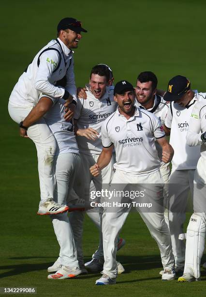 Liam Norwell of Warwickshire celebrates after taking the wicket of Jack Brooks of Somerset to win the County Championship during Day Four of the LV=...