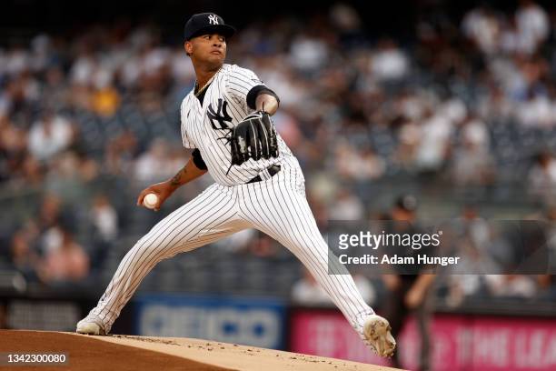 Luis Gil of the New York Yankees pitches against the Boston Red Sox in the first inning during game two of a doubleheader at Yankee Stadium on August...