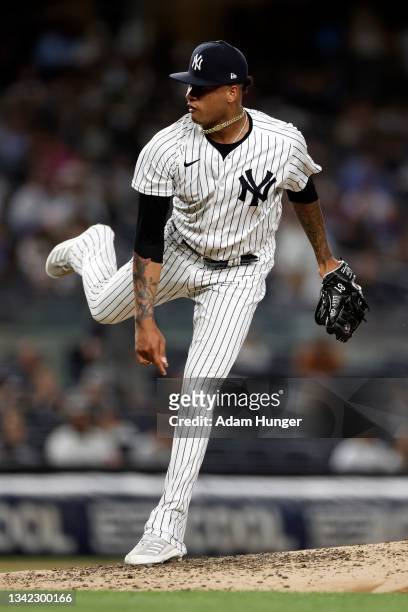 Luis Gil of the New York Yankees pitches against the Boston Red Sox in the fourth inning during game two of a doubleheader at Yankee Stadium on...
