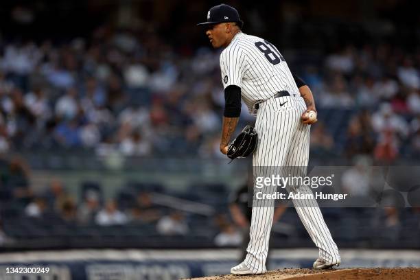 Luis Gil of the New York Yankees pitches against the Boston Red Sox in the second inning during game two of a doubleheader at Yankee Stadium on...