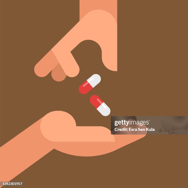 close up of hand giving medicines to another hand concept. modern simple flat illustration. - hand pill stock illustrations