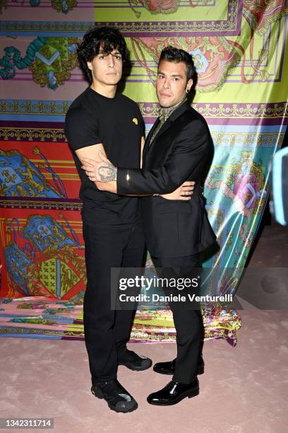 Luis Sal and Fedez are seen on the front row of the Versace fashion show during the Milan Fashion Week - Spring / Summer 2022 on September 24, 2021...
