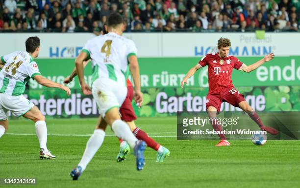 Thomas Mueller of FC Bayern Muenchen scores their team's first goal during the Bundesliga match between SpVgg Greuther Fürth and FC Bayern München at...