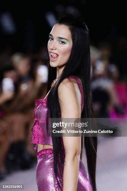 Dua Lipa walks the runway at the Versace fashion show during the Milan Fashion Week - Spring / Summer 2022 on September 24, 2021 in Milan, Italy.