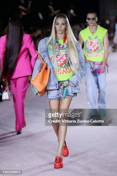 Vittoria Ceretti walks the runway at the Versace fashion show during the Milan Fashion Week - Spring / Summer 2022 on September 24, 2021 in Milan,...