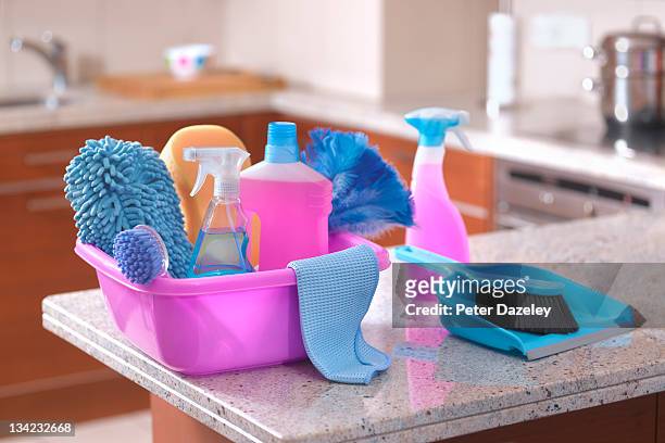 spring cleaning equipment in kitchen - detersivi foto e immagini stock