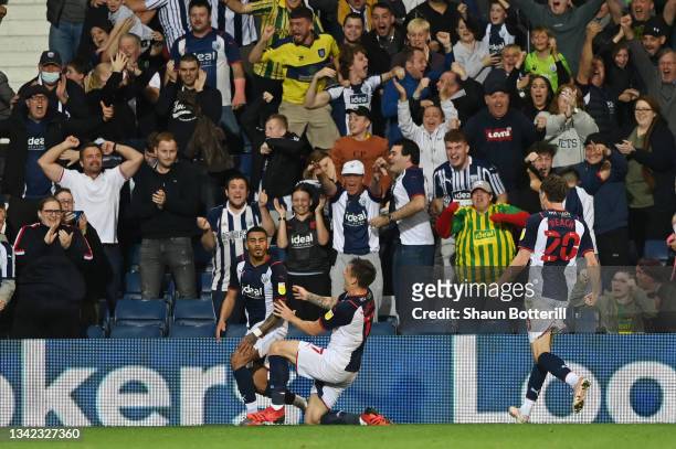 Karlan Grant of West Bromwich Albion celebrates with Jordan Hugill after scoring their team's second goal during the Sky Bet Championship match...