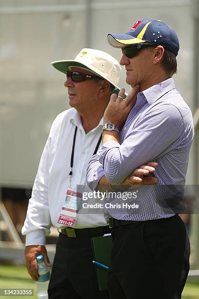 Australian Selectors Rod Marsh Andy Bichel look on during an Australian training session at The Gabba on November 29, 2011 in Brisbane, Australia.