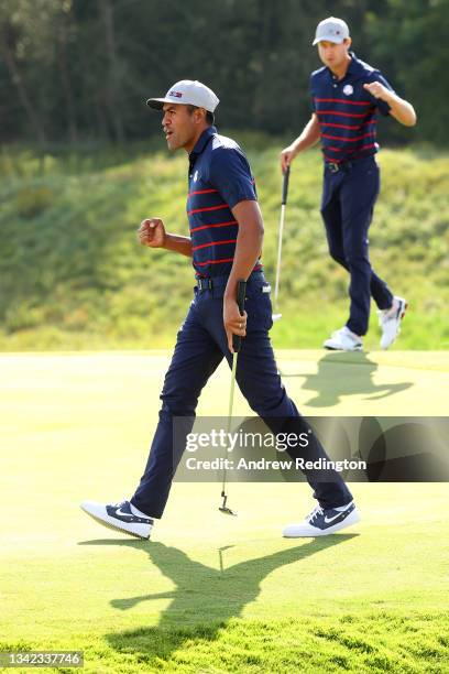 Tony Finau of team United States and Harris English of team United States react on the 10th green during Friday Afternoon Fourball Matches of the...