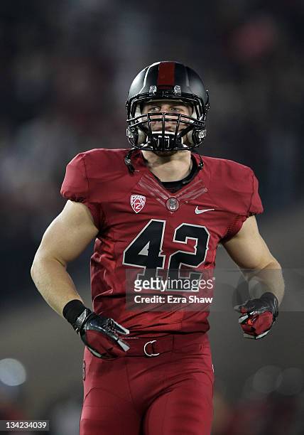 Alex Debniak of the Stanford Cardinal runs on to the field for their game against the Notre Dame Fighting Irish at Stanford Stadium on November 26,...