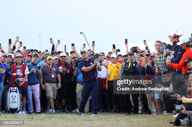 Bryson DeChambeau of team United States plays his shot on the 16th hole during Friday Afternoon Fourball Matches of the 43rd Ryder Cup at Whistling...