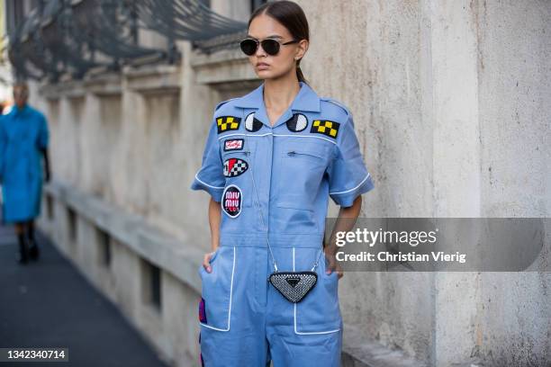 Guest is seen outside Prada during the Milan Fashion Week - Spring / Summer 2022 on September 24, 2021 in Milan, Italy.