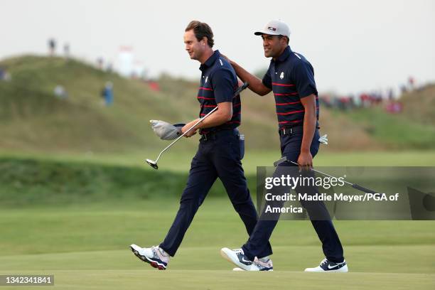 Harris English of team United States and Tony Finau of team United States celebrate on the 15th green during Friday Afternoon Fourball Matches of the...