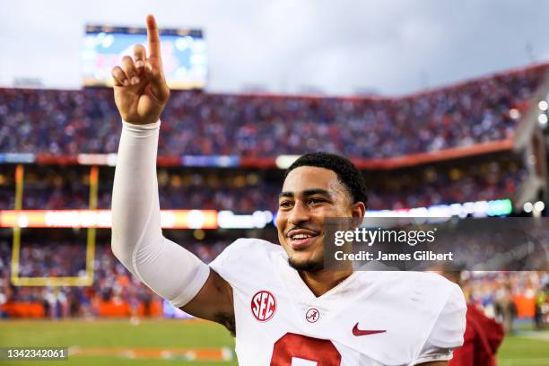 Bryce Young of the Alabama Crimson Tide celebrates after defeating the Florida Gators 31-29 at Ben Hill Griffin Stadium on September 18, 2021 in...