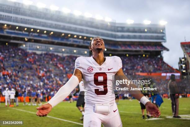 Bryce Young of the Alabama Crimson Tide celebrates after defeating the Florida Gators 31-29 at Ben Hill Griffin Stadium on September 18, 2021 in...