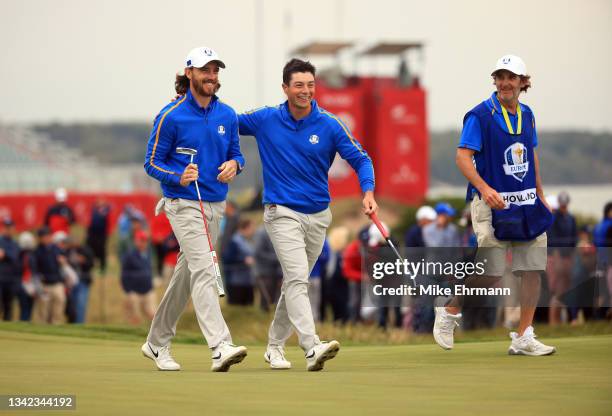 Tommy Fleetwood of England and team Europe and Viktor Hovland of Norway and team Europe reacts on the 15th green during Friday Afternoon Fourball...