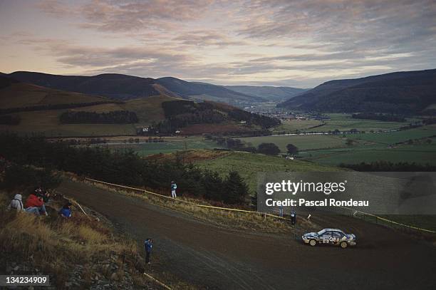 Alessandro Fiorio and co driver Luigi Pirollo of Italy driving the Q8 Team Ford Sierra Cosworth 4x4 during the FIA World Rally Championship 46th...