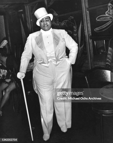 Blues singer and pianist Gladys Bentley poses for a portrait backstage at the Ubangi Club in Harlem circa 1930 in New York City, New York.