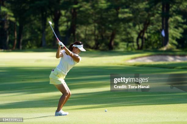 Hikari Fujita of Japan hits her second shot on the 1st hole during the final round of the Chugoku Shimbun Chupea Ladies Cup at the Geinan Country...