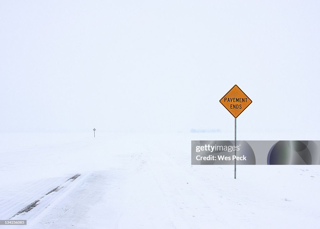 Pavement ends sign