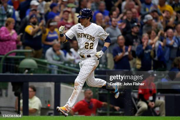 Christian Yelich of the Milwaukee Brewers hits a solo home run in the third inning against the New York Mets at American Family Field on September...