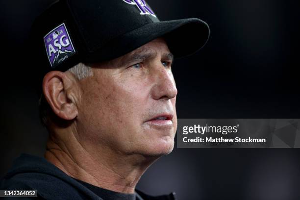 Manager Bud Black of the Colorado Rockies watches from the dugout as his team plays the San Francisco Giants in the second inning at Coors Field on...