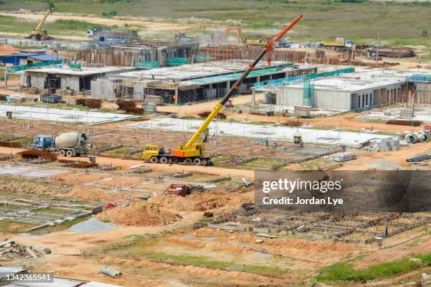 aerial view of construction site - reclaimed land stock pictures, royalty-free photos & images