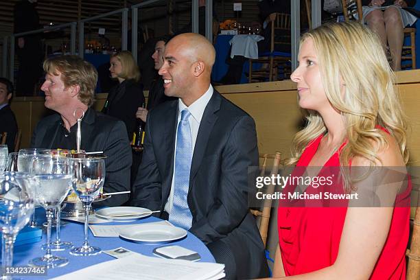 Former professional tennis player Jim Courier, tennis player James Blake and fiance Emily Snider attend James Blake's Serving for a Cure Charity...