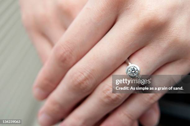 wedding ring - diamond ring hand stock pictures, royalty-free photos & images