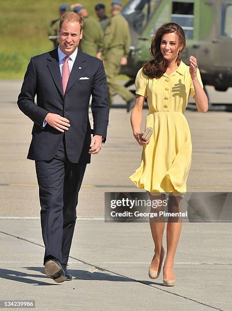 Prince William, Duke of Cambridge and Catherine, Duchess of Cambridge arrive at the Calgary International Airport on July 7, 2011 in Calgary, Canada.