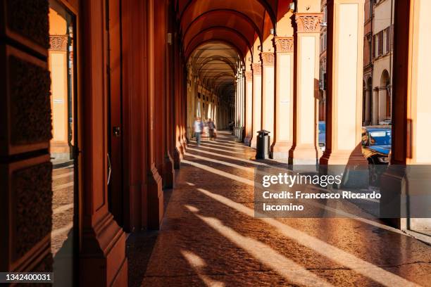 the porticoes of bologna, unesco world heritage site 2021 . emilia romagna, italy - colonnade stock pictures, royalty-free photos & images