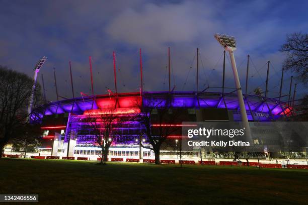 General view of the MCG lit up in Melbourne colours is seen ahead of the AFL Grand Final, played at Optus Stadium in Perth, at the MCG on September...