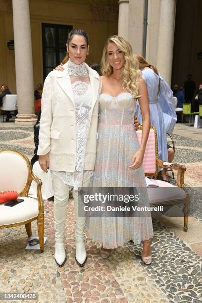 Francesca Sofia Novello and Alice Campello are seen on the front row of the Ermanno Scervino fashion show during the Milan Fashion Week - Spring /...