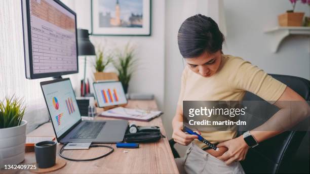 covid-19 working from home and diabetes management - insulin stock pictures, royalty-free photos & images