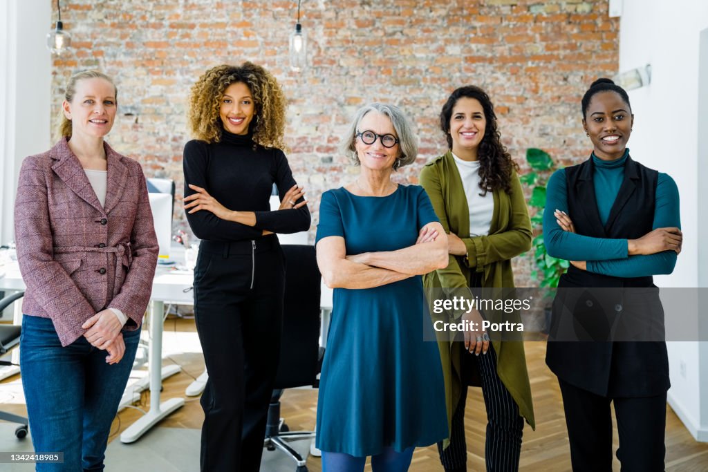 Portrait of successful female business team in office