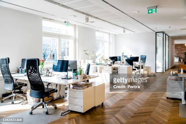 modern bright office space - desk stock pictures, royalty-free photos & images