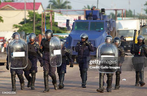 Riot police patrol on November 28, 2011 in Kinshasa, Democratic Republic of Congo. Over 30 million people registered to vote in elections that have...