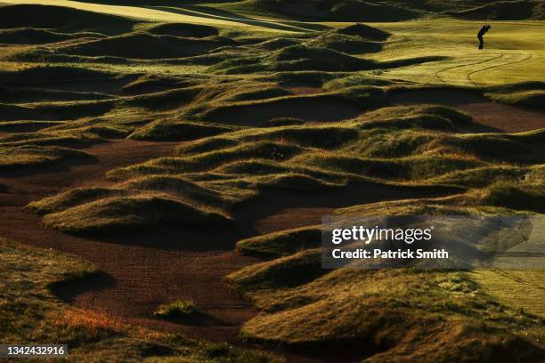 Dustin Johnson of team United States plays his shot on the first hole during Saturday Morning Foursome Matches of the 43rd Ryder Cup at Whistling...