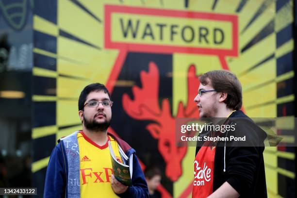 Fans are seen outside the stadium ahead of the Premier League match between Watford and Newcastle United at Vicarage Road on September 25, 2021 in...