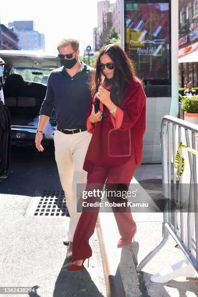 Prince Harry and Meghan Markle seen at Melba's restaurant in Harlem for lunch on September 24, 2021 in New York City.