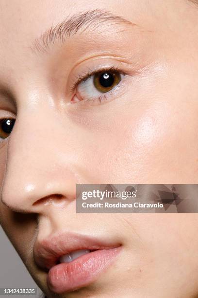 Model, skin detail, poses in the backstage of the Ermanno Scervino fashion show during the Milan Fashion Week - Spring / Summer 2022 on September 25,...